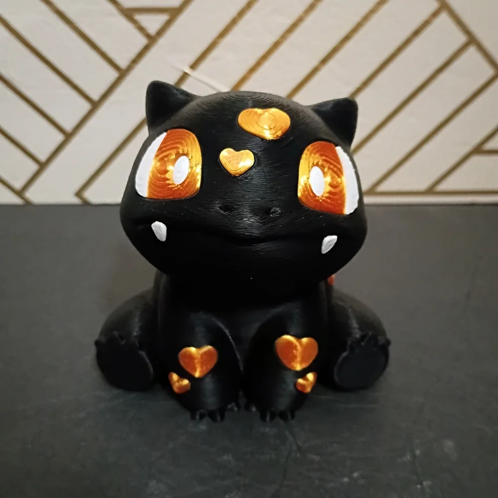 Black and Gold Figurine